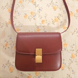 Red Wine Color Small Crossbody Bag with Gold Hardware.